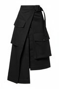 Black layered skirt with button details on a white background