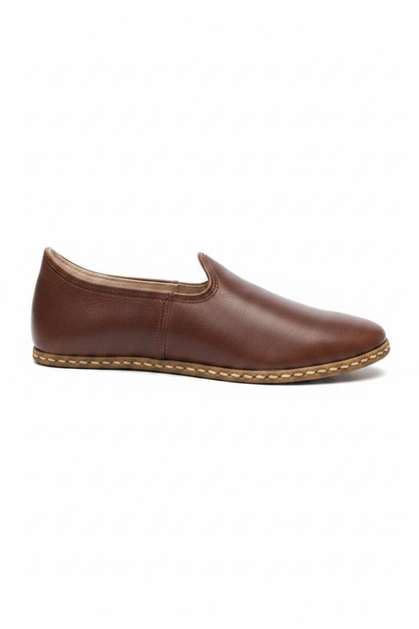 Purple flat shoe on a white background