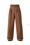 Brown pleated pants on a white background