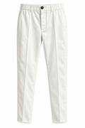 White slim-fit trousers with an elastic waistband and a single button closure, shown against a plain white background.